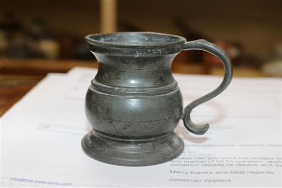 Five graduated pewter tankards, tallest 17cm